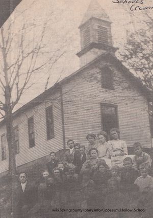  A photo of Opossum Hollow School and students.
