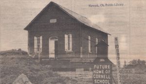  A photo of the Cornell School sitting on jacks at its new location.